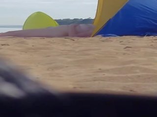 Bewitching milf spied at beach (please comment)