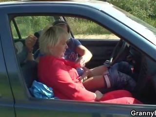 Old whore gives head in the car then doggystyled
